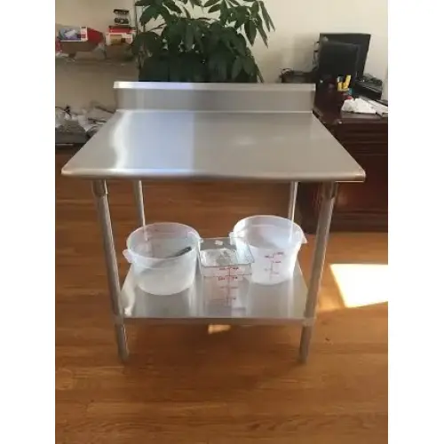 Universal B5SG2436 - 36" X 24" Stainless Steel Work Table W/ Back Splash and Galvanized Under Shelf